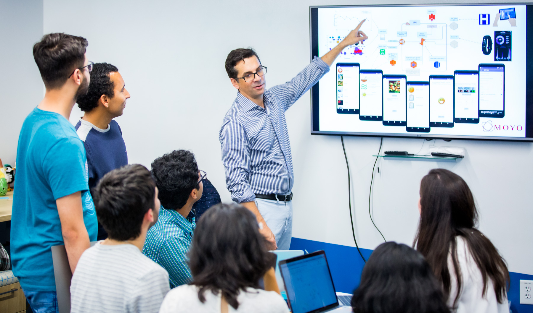 man giving a presentation to a class